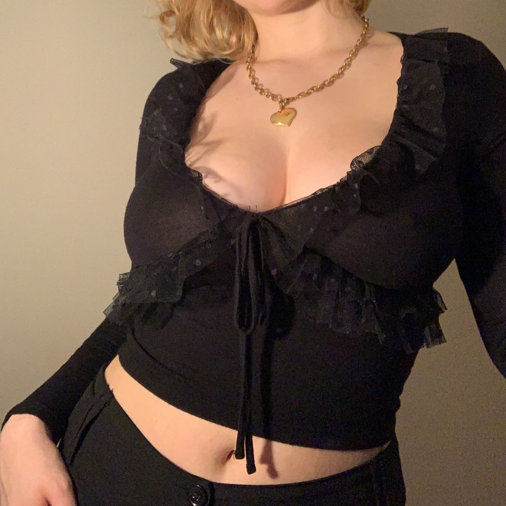 Black ruffle deep cut top